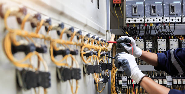 Professional Electrician technician working in Garrison, TX